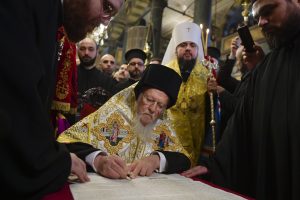 Patriarch Bartholomew signs Tomos of Autocephaly for newly - established Ukrainian church